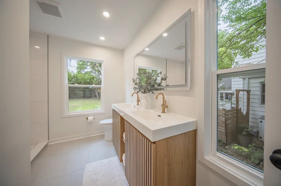 Bathroom with wood vanity