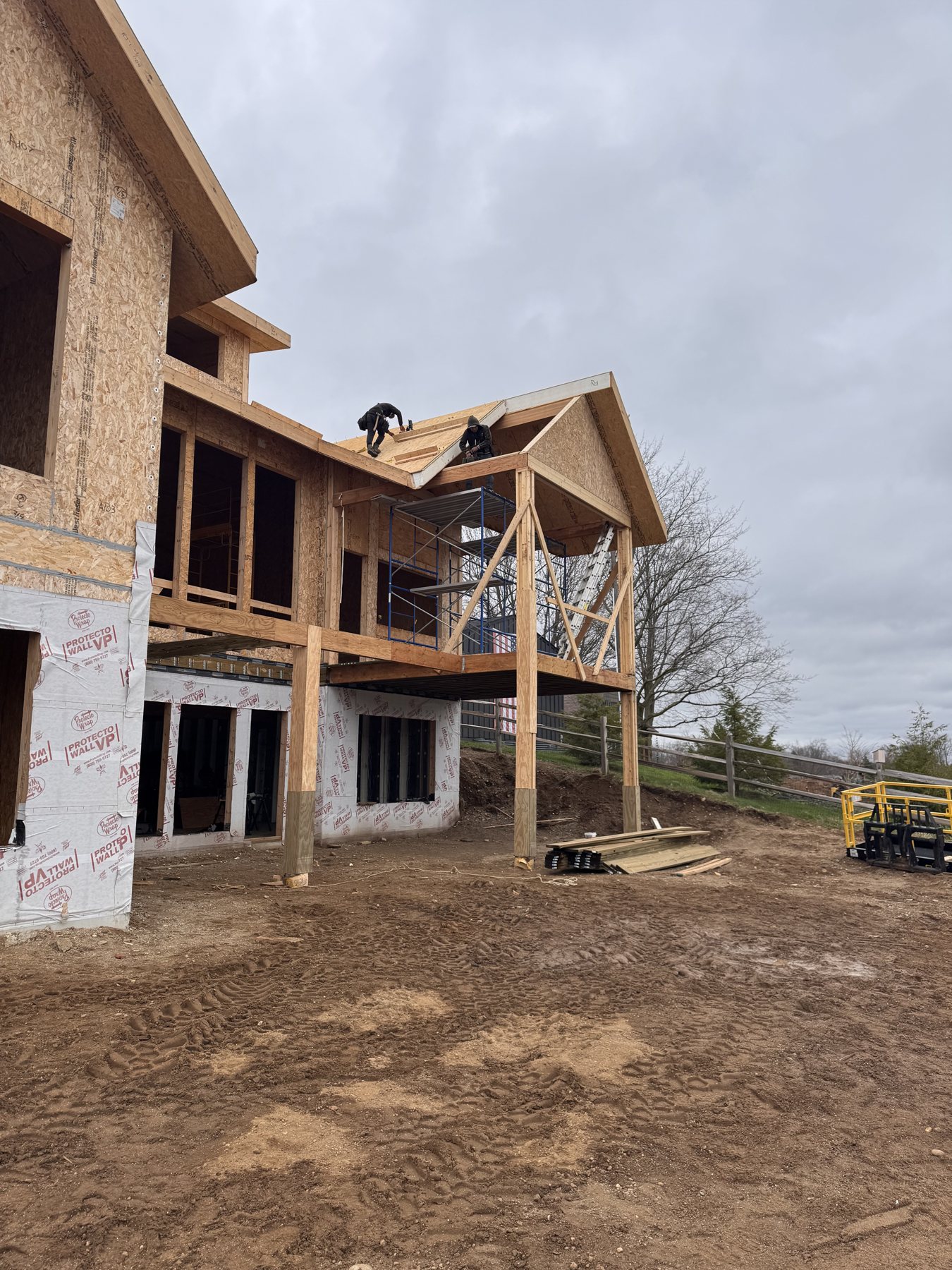 Two-story addition being framed and sheathed