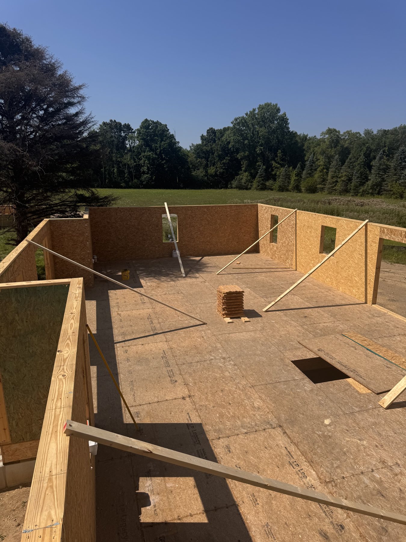 SIP walls set on a new floor deck