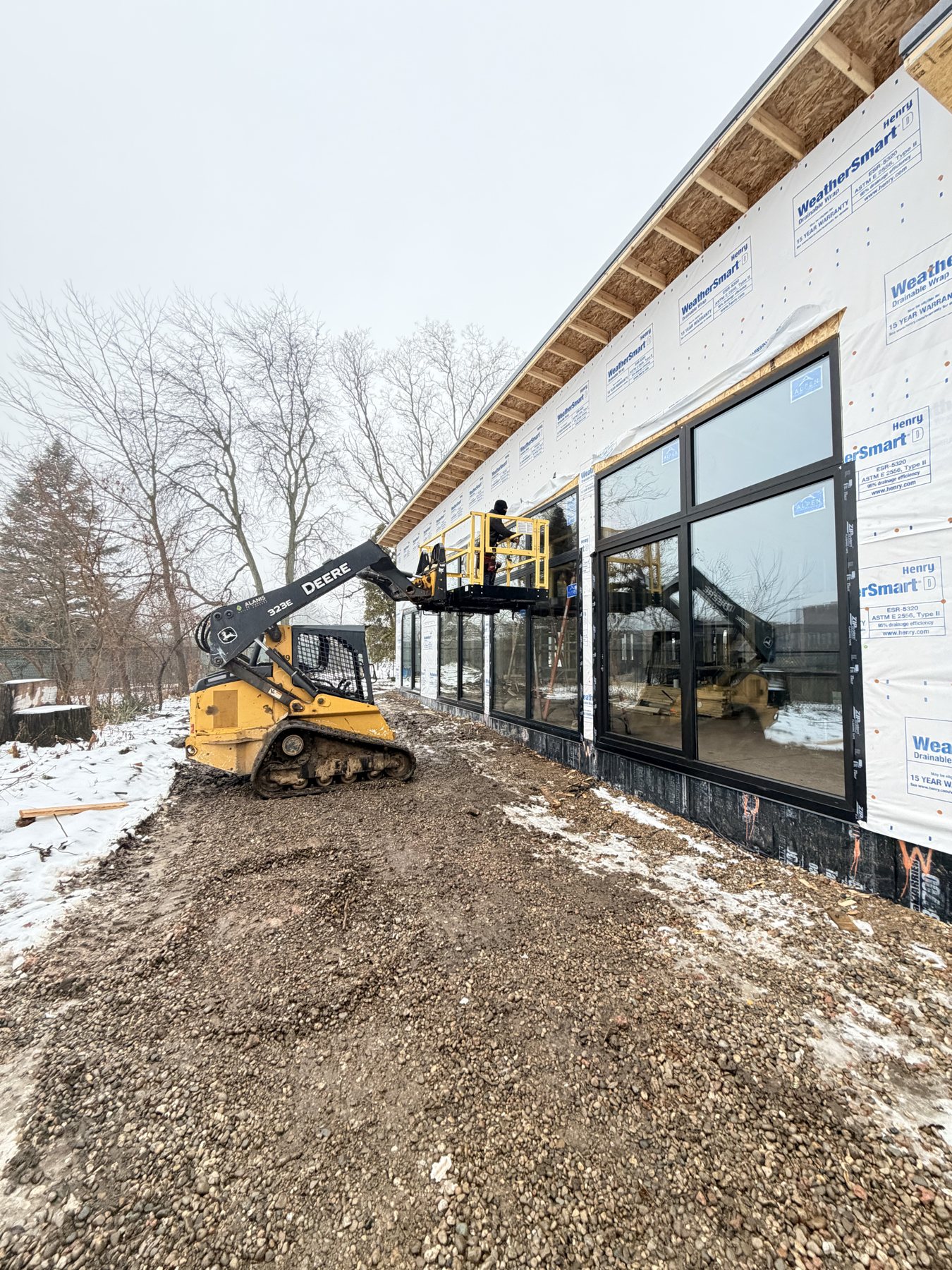 High-performance windows going in on a new home in winter