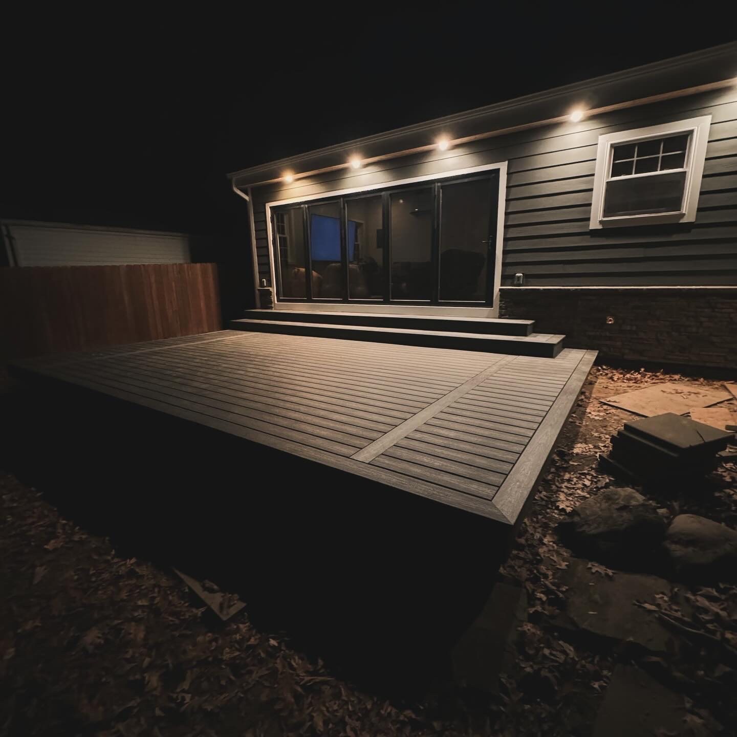 Deck with built-in lights at night