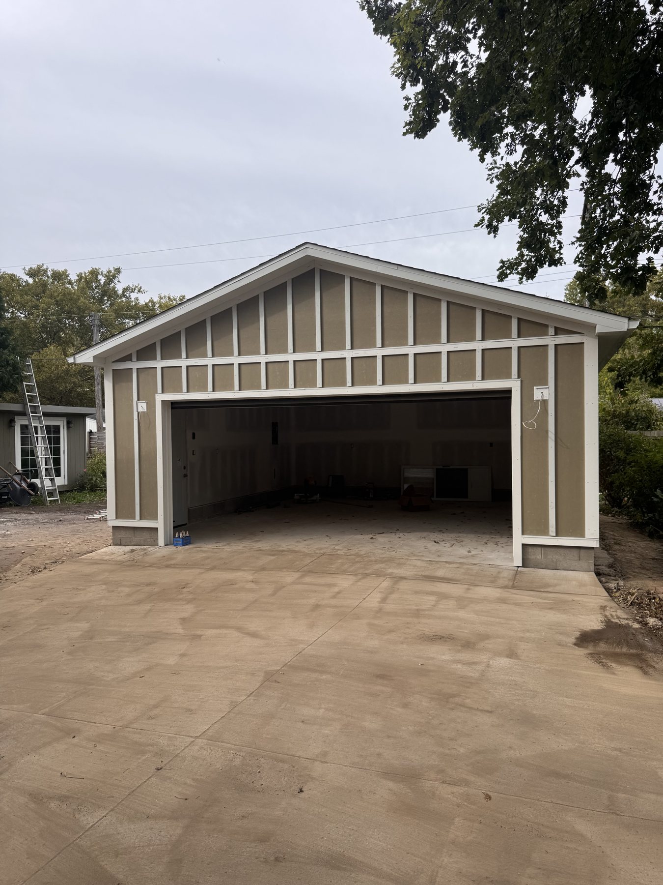 New detached garage with board-and-batten siding